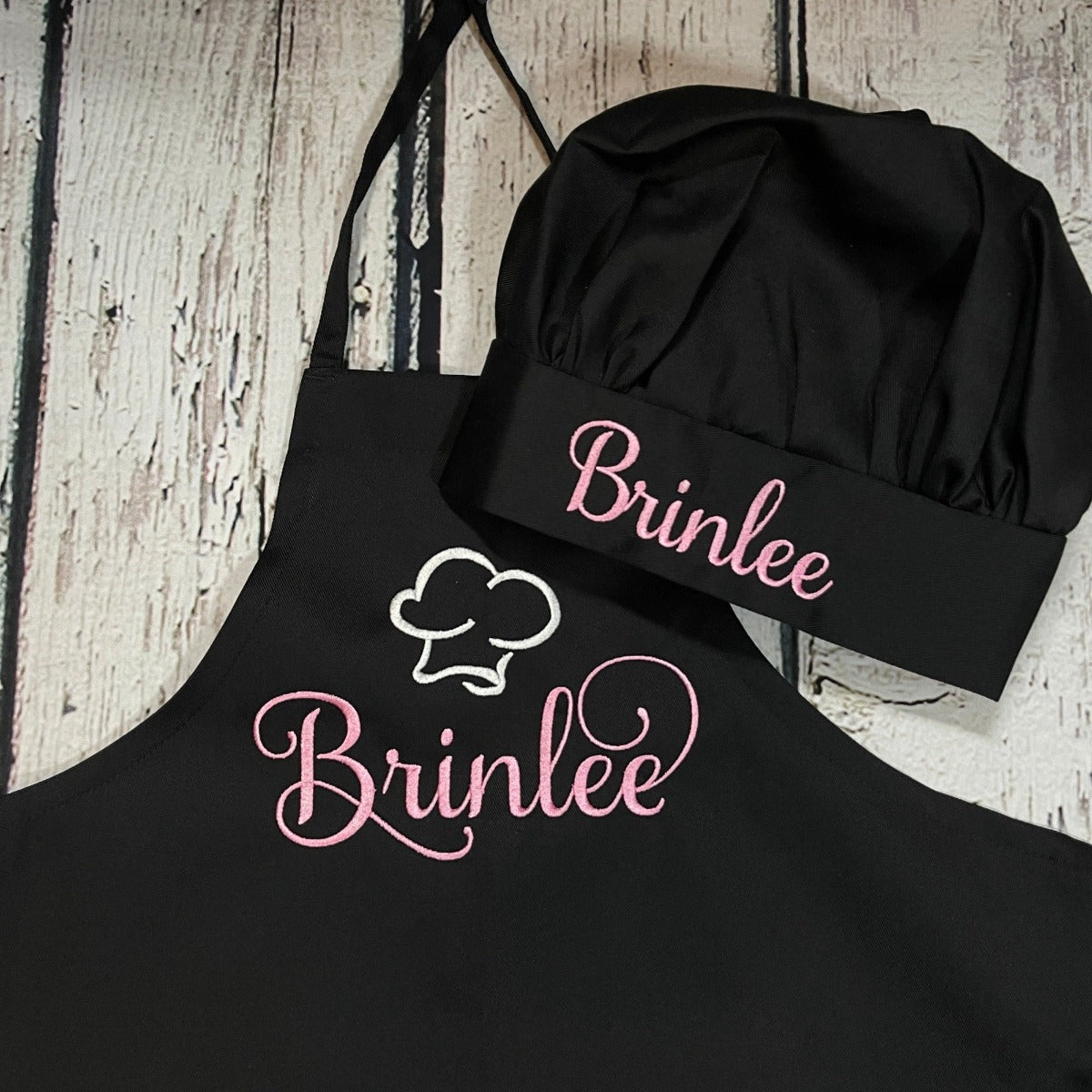 Girls Personalized Embroidered Apron with pockets and Elegant Swirl name- Pink on Black
