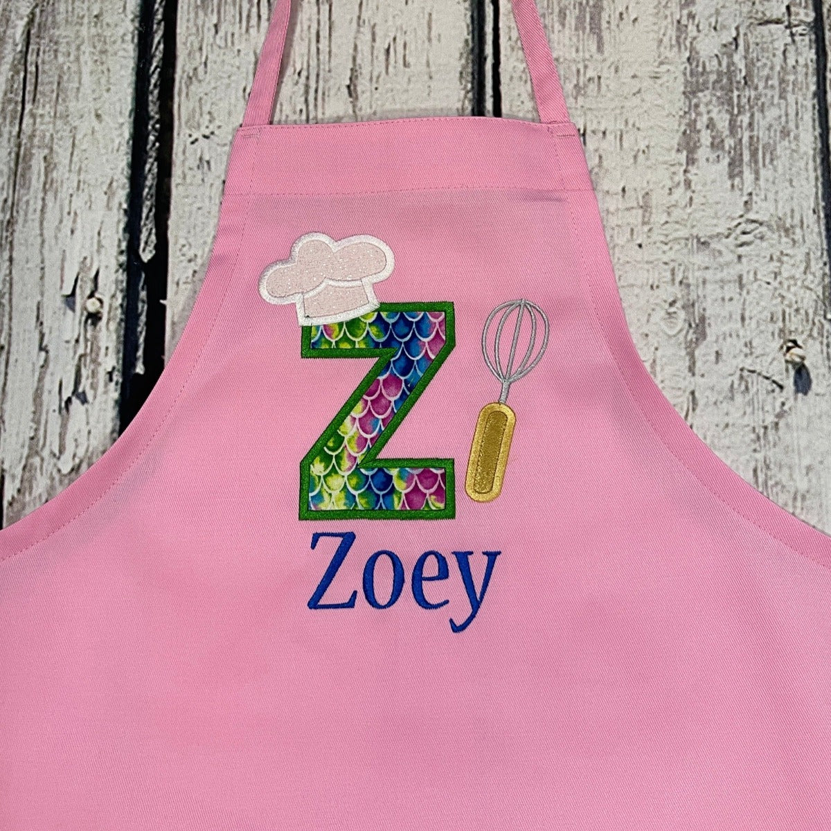 Girls personalized pink apron with mermaid theme large initial