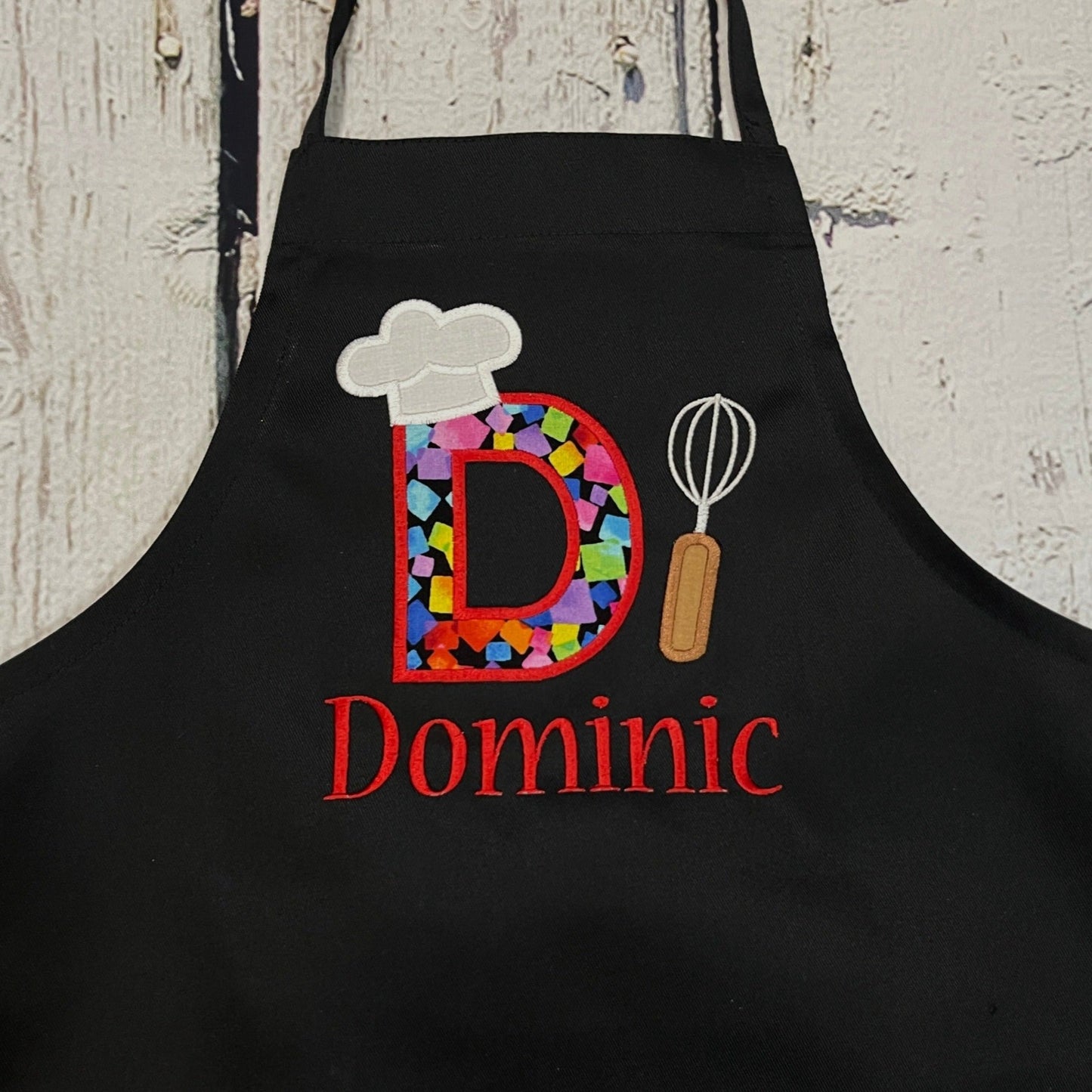 Boys personalized embroidered apron with large initial and name on black apron