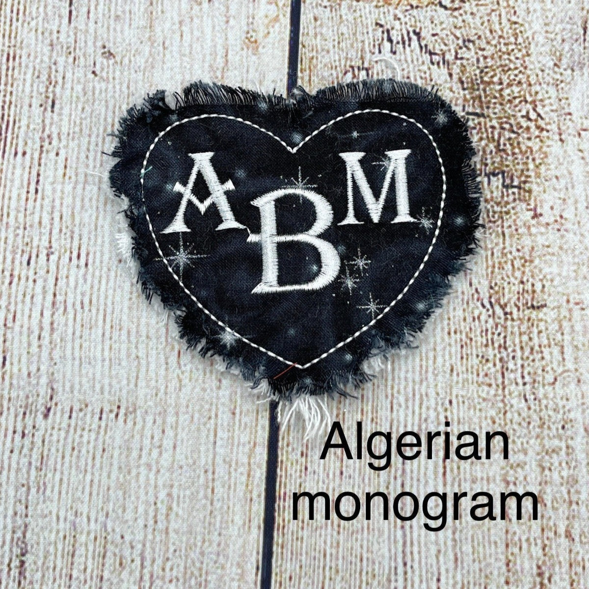 monogram patch heart frayed edges black