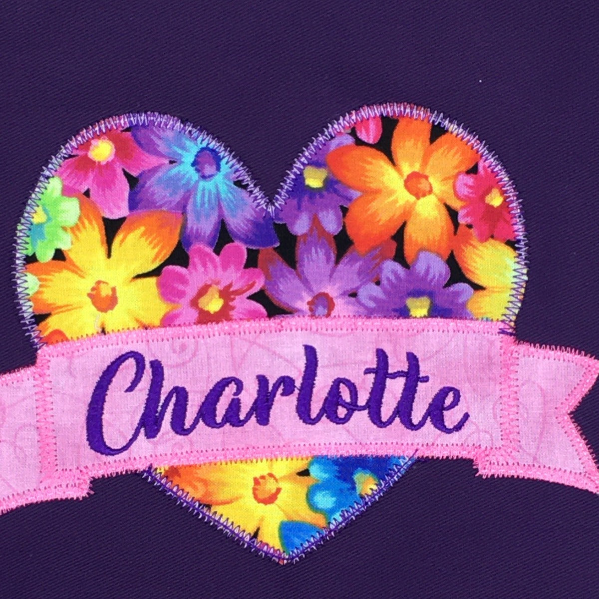 Purple girls apron with floral heart