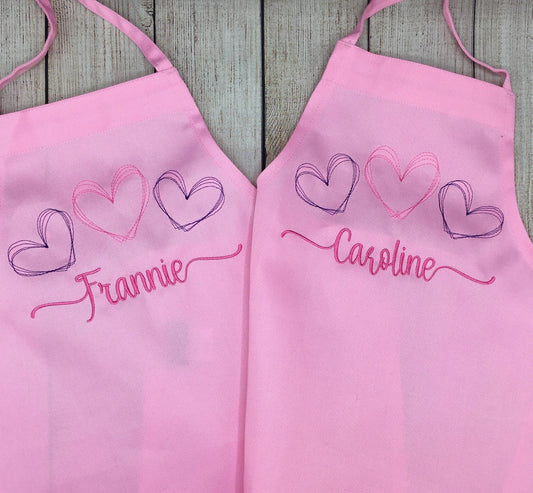 Girls personalized embroidered apron with hearts and their name