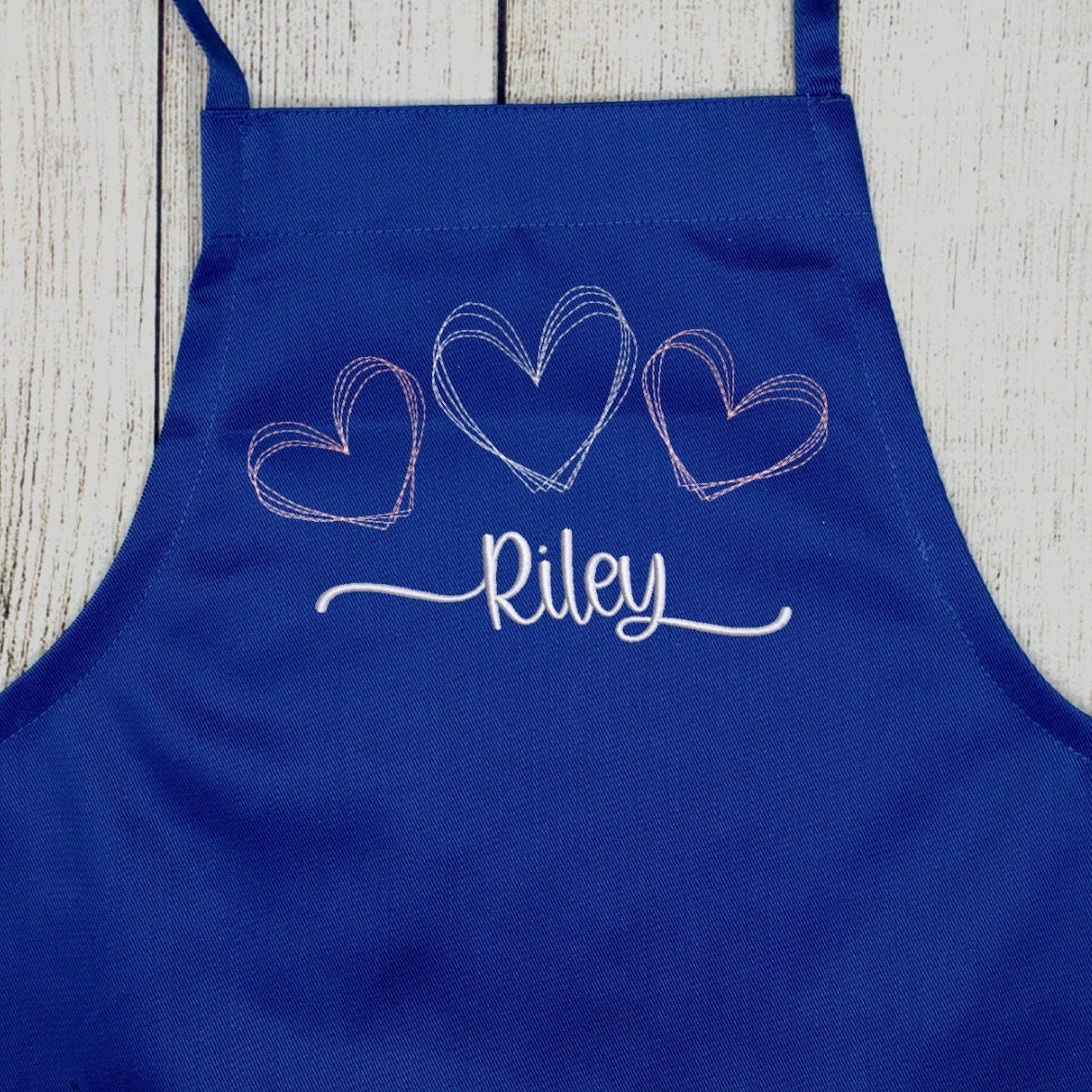 Blue apron for girls with hearts and name