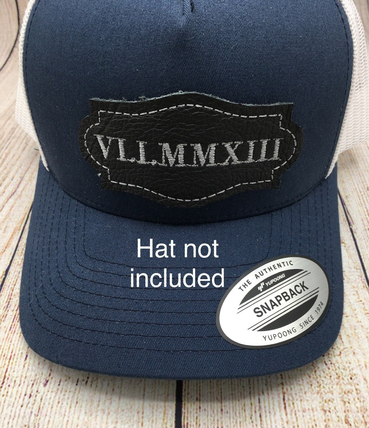 roman numeral date patch on blue hat