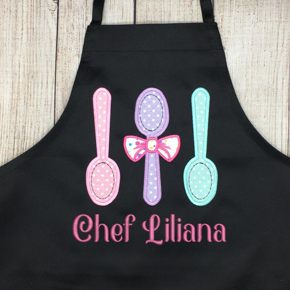Black girls apron with embroidered spoons  and name